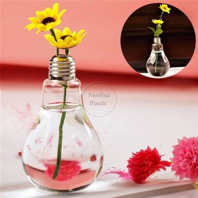 गर्म बिक्री जूस ग्लास जार प्रकाश ब्लब आकार ढक्कन के साथ 100ml मिनी आकार प्यारा प्रकाश बल्ब आकार पीईटी प्लास्टिक की बोतल