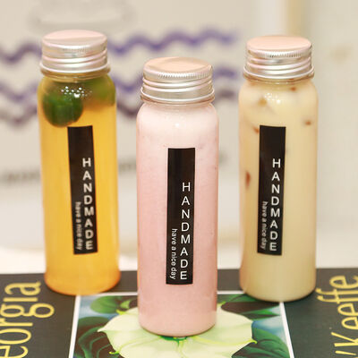 लीक प्रूफ मिल्क टी बोतलें प्लास्टिक स्क्रू ऑन ढक्कन टिकाऊ पुन: प्रयोज्य कंटेनर पेय पैकेजिंग और भंडारण के लिए आदर्श