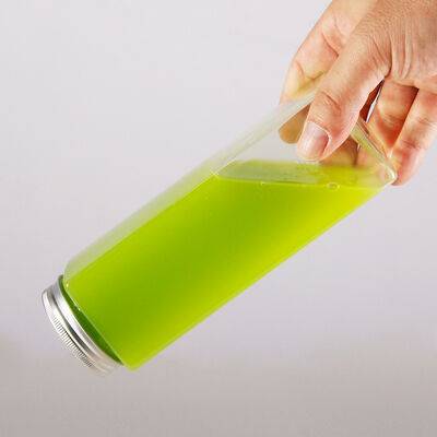 0.5 किलोग्राम दूध चाय की बोतलें जिसमें पेंच-अप ढक्कन और इन्सुलेशन शामिल हैं जो पेय उत्पादों के लिए सुरक्षित पैकेजिंग समाधान प्रदान करते हैं