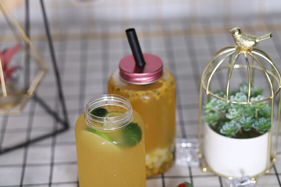 हाथ दूध चाय की बोतलें लीक-प्रूफ स्क्वायर गोल आकार वाणिज्यिक पेय वितरकों और खुदरा विक्रेताओं के लिए आदर्श