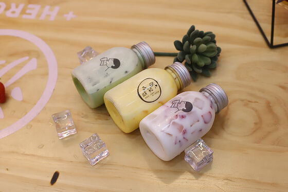 स्क्रू-ऑन ढक्कन मध्यम दूध चाय की बोतलें लीक-प्रूफ विशेषता पेय के हैंडलिंग में सुविधा और सुरक्षा सुनिश्चित करना