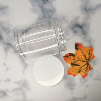 खाद्य प्रसंस्करण और खुदरा वातावरण में उपयोग किए जाने वाले प्लास्टिक भंडारण जार जिसमें प्लास्टिक ढक्कन लीक प्रतिरोधी कंटेनर हैं