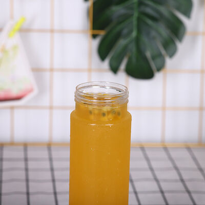 हैंडल यस मिल्क टी बोतलें 05 किग्रा स्क्रू ऑन ढक्कन लीक प्रूफ डिज़ाइन व्यावसायिक पेय पैकेजिंग और वितरण के लिए आदर्श