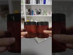 थोक कस्टम लक्जरी खाली प्लास्टिक क्रीम कॉस्मेटिक जार ढक्कन के साथ